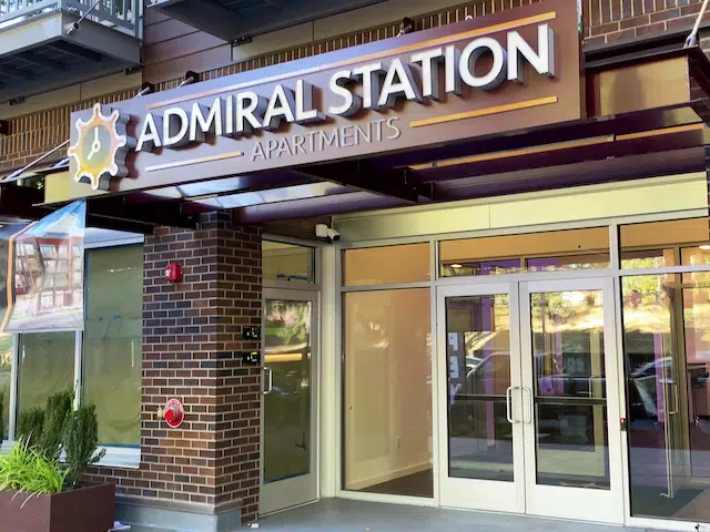 Main entrance to Admiral Station Apartments with secure resident entry in West Seattle.